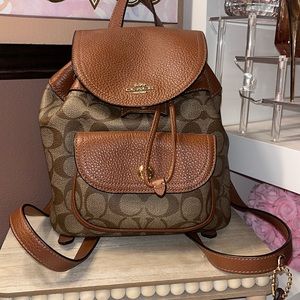 Like new mini Coach backpack in signature canvas and cognac accents